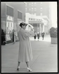 Woman Modeling Hand-Tailored Coat Print, circa 1950s