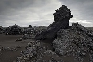 Black sand and piled up lava, Reykjanesskagi, Southern Peninsula or Reykjanes, Iceland Black sand and piled up lava, Reykjanesskagi, Southern Peninsula or Reykjanes, Iceland