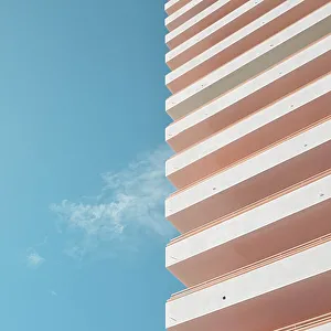 Blue sky, thin white cloud and white building Blue sky, thin white cloud and white building