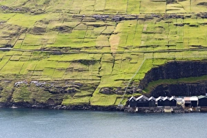 Boathouses and meadows, Vestmanna, Streymoy, Faroe Islands, Denmark Boathouses and meadows, Vestmanna, Streymoy, Faroe Islands, Denmark