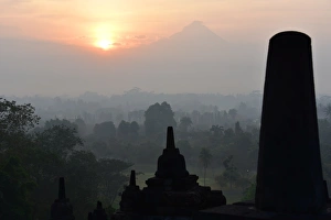 Borobudur at dusk, view on Merapi, Java Borobudur at dusk, view on Merapi, Java