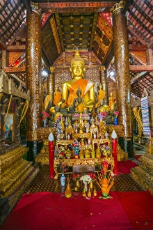 Buddha in Wat Xieng Thong Temple in Luang Prabang Buddha in Wat Xieng Thong Temple in Luang Prabang
