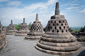 Caged Buddhas at Borobudur, Indonesia Caged Buddhas at Borobudur, Indonesia