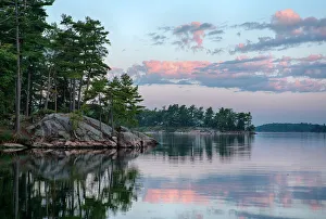 Calm summer morning on St. Lawrence River, Thousand Islands, New York State, USA Calm summer morning on St. Lawrence River, Thousand Islands, New York State, USA
