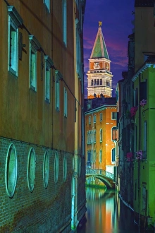 Canal in Venice in the night with the Campanile in the background Canal in Venice in the night with the Campanile in the background