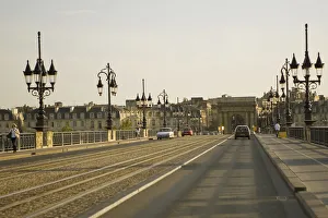 Cars on the road, Porte De Bourgogne, Pont De Pierre, Garonne River, Bordeaux, Aquitaine Cars on the road, Porte De Bourgogne, Pont De Pierre, Garonne River, Bordeaux, Aquitaine