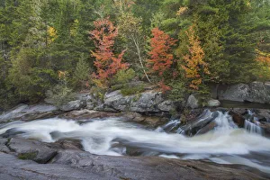 The cascades of Little Niagara Falls with Autumn colors, in Baxter State Park, Maine, USA The cascades of Little Niagara Falls with Autumn colors, in Baxter State Park, Maine, USA
