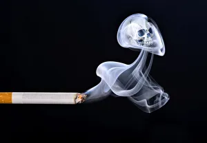 Cigarette with smoke and a skull, smoking kills, symbolic image of death from smoking Cigarette with smoke and a skull, smoking kills, symbolic image of death from smoking