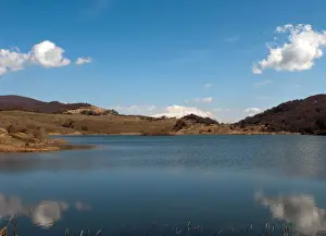 Volcanic Crater Scenery Prints: Clouds mirroring on the lake