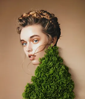 Collage with female portrait and green plant Collage with female portrait and green plant