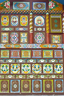 Colorful Tibetan designs on walls of temple, Jiuzhaigou National Scenic Area Colorful Tibetan designs on walls of temple, Jiuzhaigou National Scenic Area