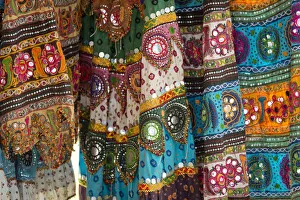 Colourful skirts inlaid with mirrors and different patterns, detail, Udaipur, Rajasthan Colourful skirts inlaid with mirrors and different patterns, detail, Udaipur, Rajasthan