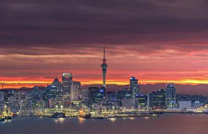 Colourful sky over Auckland city with city night light