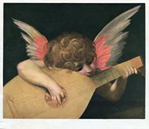 Cupid angel Amor playing love songs on the guitar Cupid angel Amor playing love songs on the guitar