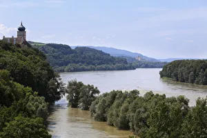 Danube River with Schloss Schoenbuehel Palace, in the distance, Melk Abbey, Wachau Danube River with Schloss Schoenbuehel Palace, in the distance, Melk Abbey, Wachau