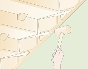 Digital Illustration of using mallet to tap loose wedges back into place below staircase Digital Illustration of using mallet to tap loose wedges back into place below staircase
