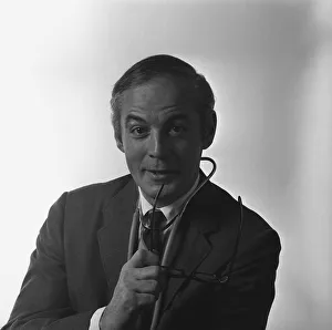 Doctor in full suit posing in studio, (B&W), portrait Doctor in full suit posing in studio, (B&W), portrait