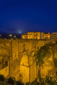 El Puente Nuevo bridge at night, Ronda, Malaga province, Andalucia, Spain El Puente Nuevo bridge at night, Ronda, Malaga province, Andalucia, Spain
