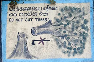 Environmental protection, painted sign, Do not cut trees depicting a felled tree Environmental protection, painted sign, Do not cut trees depicting a felled tree
