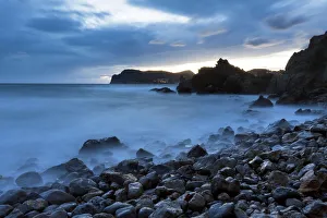 Evening at the sea with waves in Peguera, Majorca, Balearic Islands, Spain, Europe Evening at the sea with waves in Peguera, Majorca, Balearic Islands, Spain, Europe