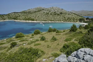 Excursion boats in Lojena Bay, Levrnaka Island, Kornati islands, Kornati National Park Excursion boats in Lojena Bay, Levrnaka Island, Kornati islands, Kornati National Park