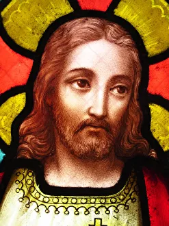 The face of Jesus Christ on an antique stained glass window The face of Jesus Christ on an antique stained glass window
