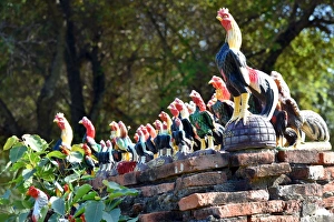 Fighting cocks statues Wat Phukhao Thong temple Ayutthaya Thailand Fighting cocks statues Wat Phukhao Thong temple Ayutthaya Thailand