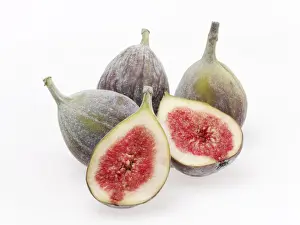 White Background Fruit Photos Prints: Figs, three whole and two halves