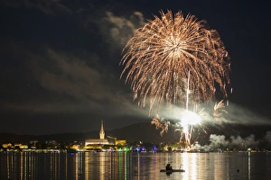 Fireworks during the Hausherrenfest festival, couple on a floating island in Lake Constance at the front, Radolfzell Fireworks during the Hausherrenfest festival, couple on a floating island in Lake Constance at the front, Radolfzell
