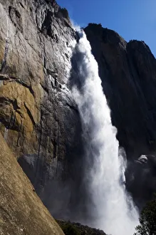 First light on Upper Yosemite Fall at peak flow in the spring in Yosemite National Park First light on Upper Yosemite Fall at peak flow in the spring in Yosemite National Park