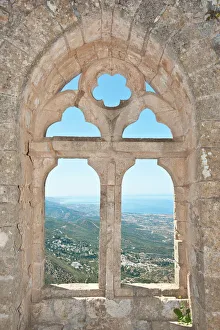 Gothic tracery, decorated window, St. Hilarion Castle, crusader castle, overlooking sea and coast Gothic tracery, decorated window, St. Hilarion Castle, crusader castle, overlooking sea and coast