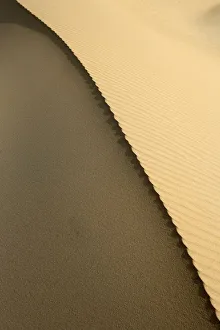 High Angle View of the Edge of Sand Dune with Ripples High Angle View of the Edge of Sand Dune with Ripples