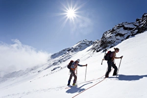 Hikers on Weissbrunnferner Mountain during the ascent to Hinterer Eggenspitz Mountain in Hikers on Weissbrunnferner Mountain during the ascent to Hinterer Eggenspitz Mountain in