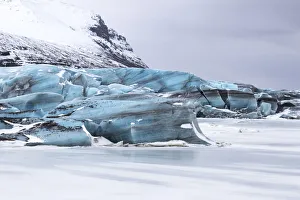 Huge chunks of ice pushed into frozen lagoon, Skaftafelljokull Glacier, Skaftafell National Park, Southwest Iceland Huge chunks of ice pushed into frozen lagoon, Skaftafelljokull Glacier, Skaftafell National Park, Southwest Iceland