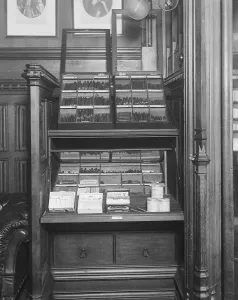 Prints of November 1919: Members cigar and cigarette cabinet at the House of Commons in London. (Photo by A. R. Coster/Topical Press Agency/Getty Images) Politic Prints: Parliamentary Smoke Print: Cigar and Cigarette Cabinet