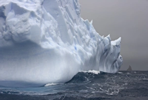 Iceberg and sea waves, South Georgia Island Iceberg and sea waves, South Georgia Island