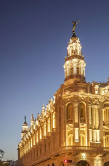 Illuminated historical building and sunset sky Illuminated historical building and sunset sky