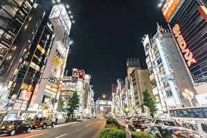 Illuminated streets of Shinjuku at night, Tokyo, Japan Illuminated streets of Shinjuku at night, Tokyo, Japan