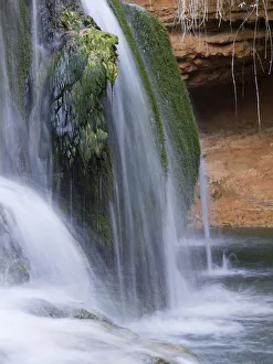 Jets of white silky water from a waterfall moss Jets of white silky water from a waterfall moss