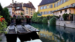 La Petite Venise (Little Venice) with moored excursion boats, Colmar, Alsace, France La Petite Venise (Little Venice) with moored excursion boats, Colmar, Alsace, France