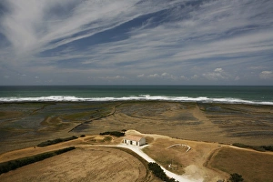 Landscape, Atlantic coast near the Phare de Chassiron lighthouse at low tide Landscape, Atlantic coast near the Phare de Chassiron lighthouse at low tide