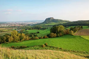 Late summer light in the Hegau region with Mt Hohentwiel, city of Singen on the left Late summer light in the Hegau region with Mt Hohentwiel, city of Singen on the left