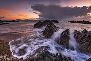 Llanddwyn Island rocks and sea, Anglesey, Wales, UK Llanddwyn Island rocks and sea, Anglesey, Wales, UK
