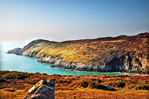 Lush rolling hills on cliffs near coast in Wales Lush rolling hills on cliffs near coast in Wales