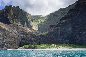 Majestic views of extreme terrain at Honopu Beach along the Na Pali Coast, Kauai, Hawaii, USA Majestic views of extreme terrain at Honopu Beach along the Na Pali Coast, Kauai, Hawaii, USA