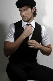 Man in his early thirties, wearing elegant clothes Man in his early thirties, wearing elegant clothes