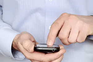 Mobile Communication Prints: Man using a smartphone