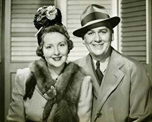 Mature couple posing dressed in outdoor clothing, (B&W), portrait Mature couple posing dressed in outdoor clothing, (B&W), portrait