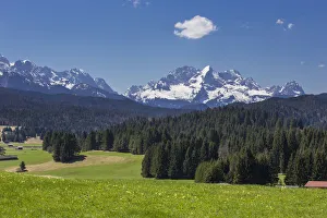 Meadow and forest in front of Alpspitze Mountain and the Wetterstein Mountains Meadow and forest in front of Alpspitze Mountain and the Wetterstein Mountains