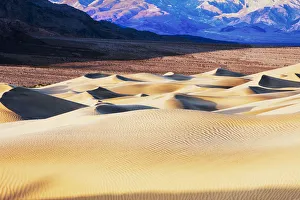 Mesquite Sand Dunes with Grapevine Mountains in background, Death Valley, California, USA Mesquite Sand Dunes with Grapevine Mountains in background, Death Valley, California, USA